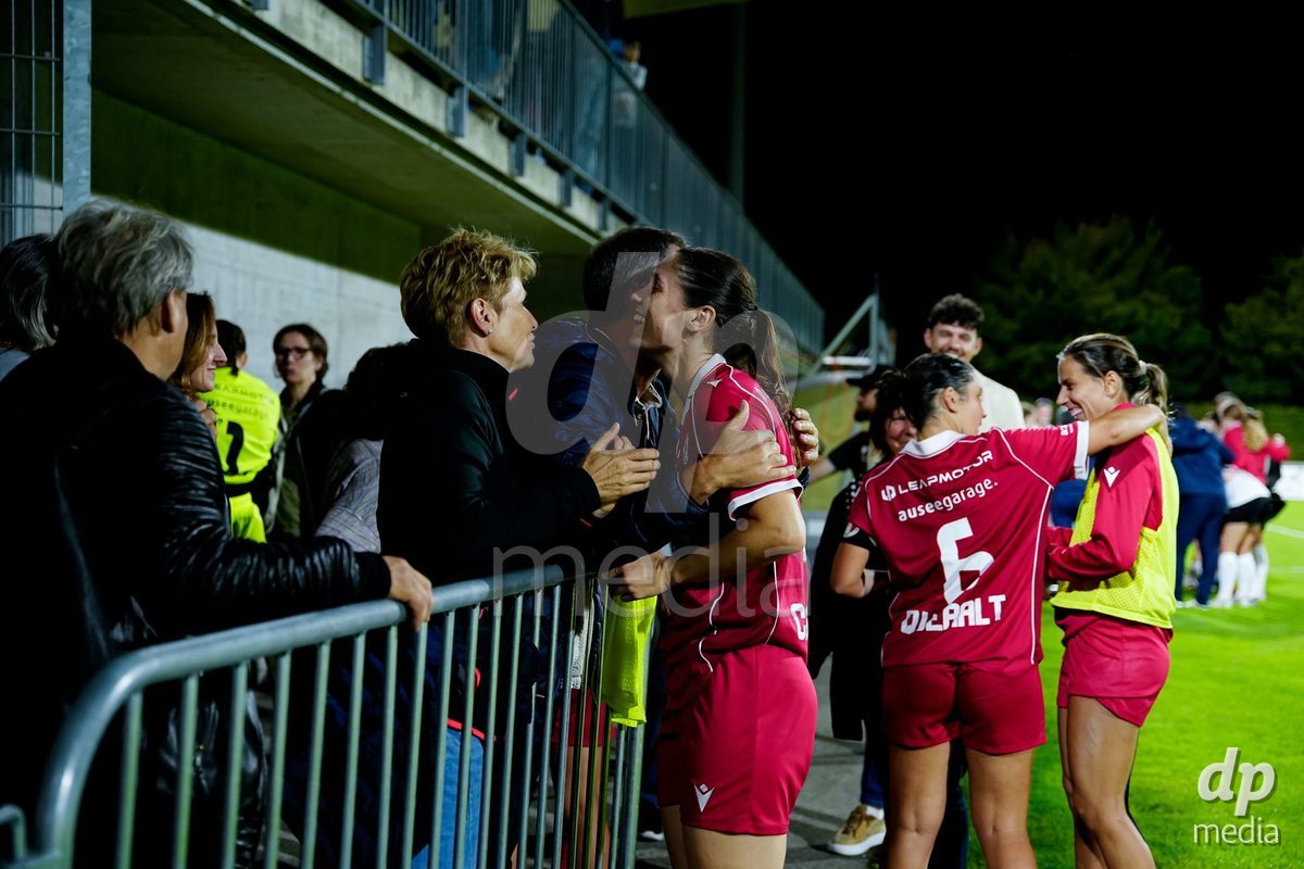 RAPPERSWIL, SWITZERLAND - OCTOBER 3: Players of FC Rapperswil-Jona with fans after the AXA Women's Super League match between FC Rapperswil-Jona and FC Aarau Frauen at Grunfeld on October 3, 2026 in Rapperswil, Switzerland.