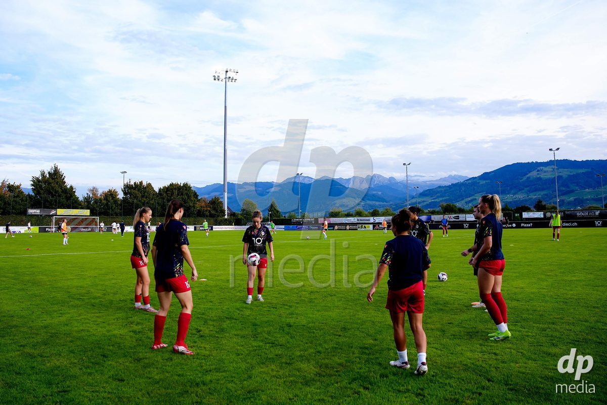 RAPPERSWIL, SWITZERLAND - OCTOBER 3: Players of FC Rapperswil-Jona warming up during the AXA Women's Super League match between FC Rapperswil-Jona and FC Aarau Frauen at Grunfeld on October 3, 2026 in Rapperswil, Switzerland.