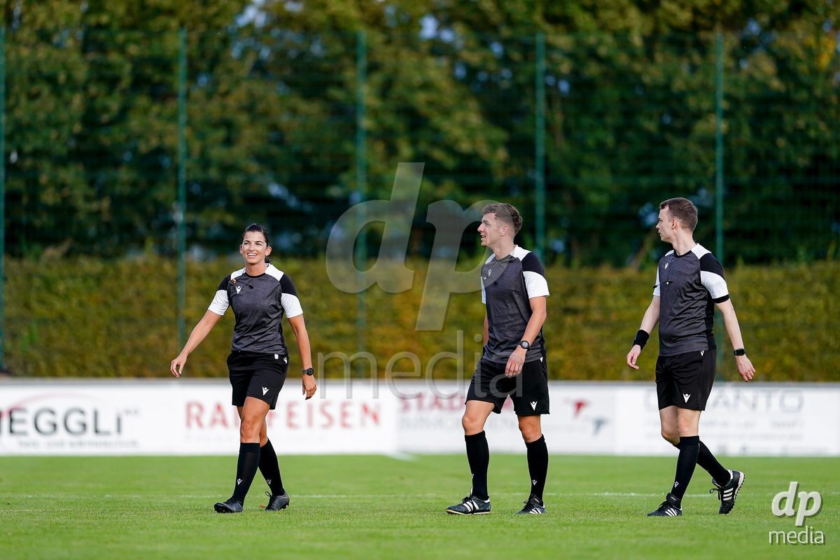 RAPPERSWIL, SWITZERLAND - OCTOBER 3: Referee Manuel Pfister (R), Referee Nathan Liniger (M) and Referee Sabrina Keinersdorfer (L) prior to the AXA Women's Super League match between FC Rapperswil-Jona and FC Aarau Frauen at Grunfeld on October 3, 2026 in Rapperswil, Switzerland.