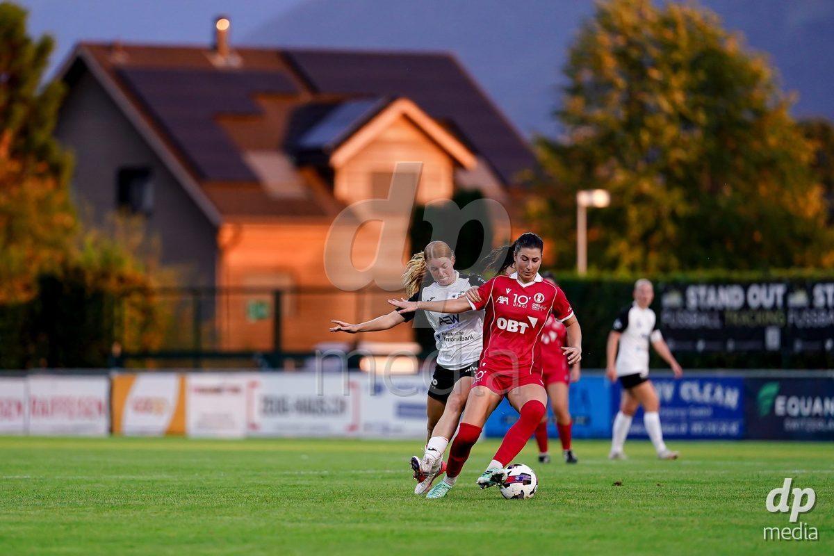 RAPPERSWIL, SWITZERLAND - OCTOBER 3: Zdravka Petrova Parapunova of FC Rapperswil-Jona (R) and Yves Milva Heim of FC Aarau Frauen (L) battle for the ball during the AXA Women's Super League match between FC Rapperswil-Jona and FC Aarau Frauen at Grunfeld on October 3, 2026 in Rapperswil, Switzerland.