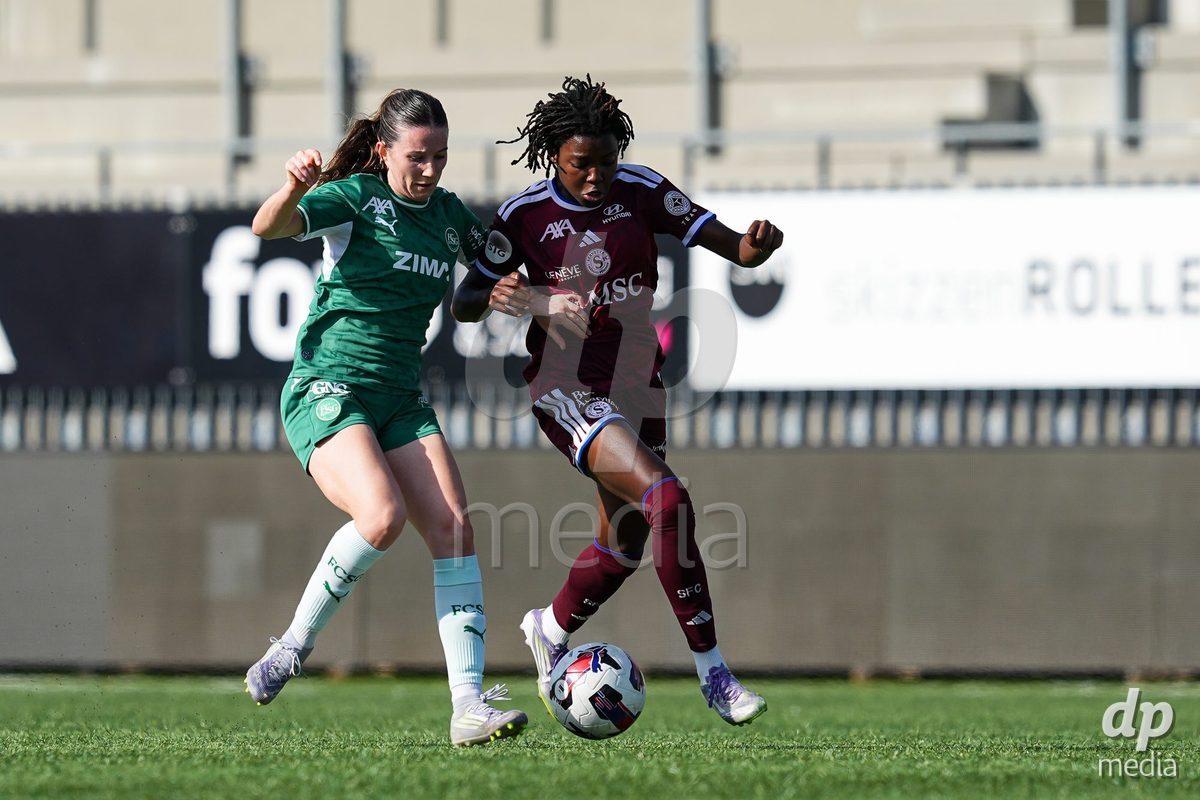 WIL, SWITZERLAND - OCTOBER 4: Chantal Wyser of FC St. Gallen (L) and Garance Nein of Servette FC Chenois Feminin battle for the ball (duel) during the AXA Women's Super League match between FC St. Gallen 1879 and Servette FC Chenois Feminin at Lidl Sportpark on October 4, 2026 in Wil, Switzerland.