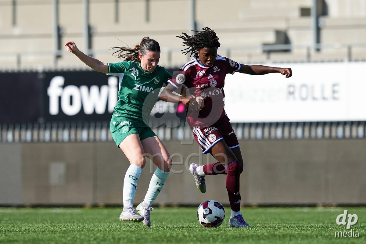 WIL, SWITZERLAND - OCTOBER 4: Chantal Wyser of FC St. Gallen (L) and Garance Nein of Servette FC Chenois Feminin battle for the ball (duel) during the AXA Women's Super League match between FC St. Gallen 1879 and Servette FC Chenois Feminin at Lidl Sportpark on October 4, 2026 in Wil, Switzerland.