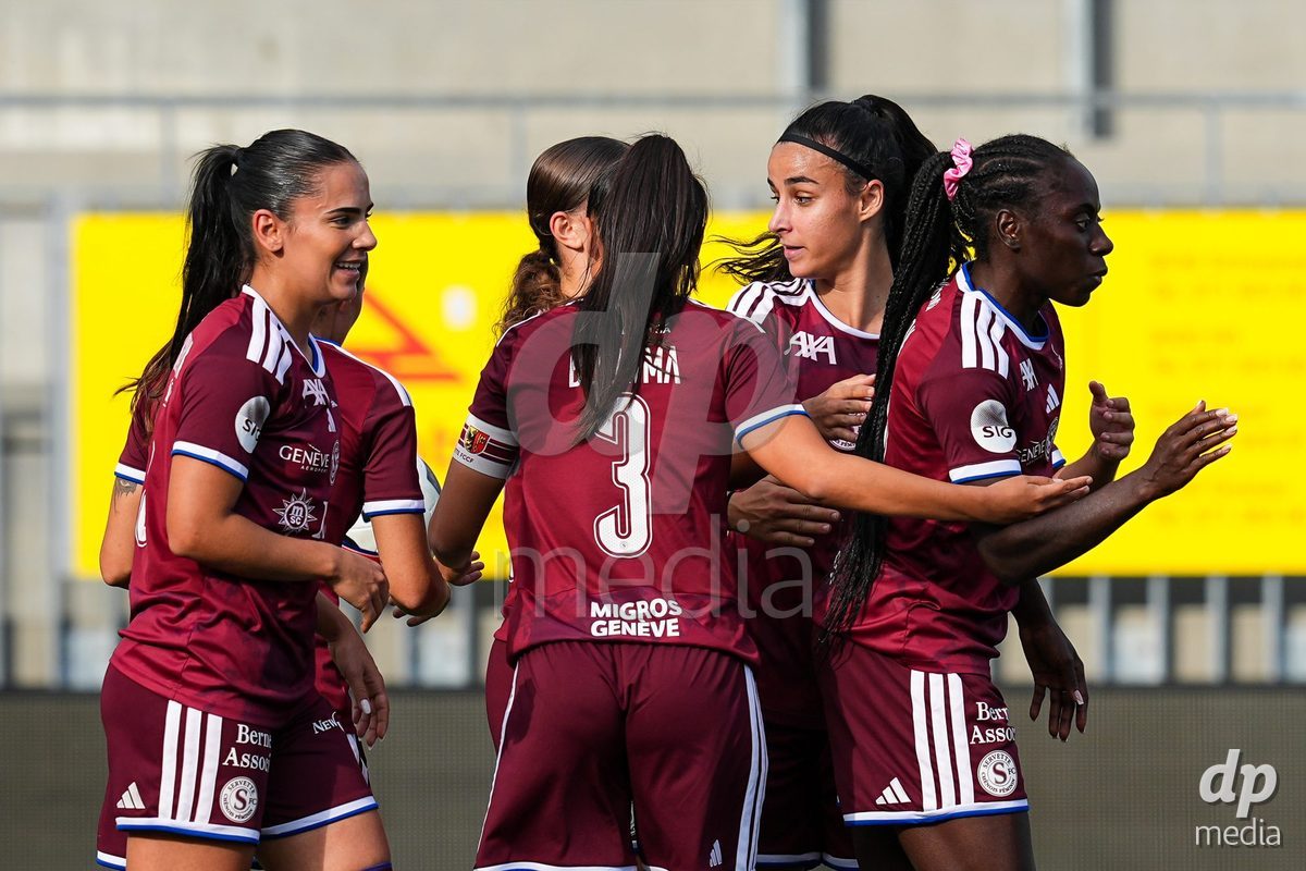 WIL, SWITZERLAND - OCTOBER 4: Benedicte Simon of Servette FC Chenois Feminin celebrates with teammates the first team goal during the AXA Women's Super League match between FC St. Gallen 1879 and Servette FC Chenois Feminin at Lidl Sportpark on October 4, 2026 in Wil, Switzerland.
