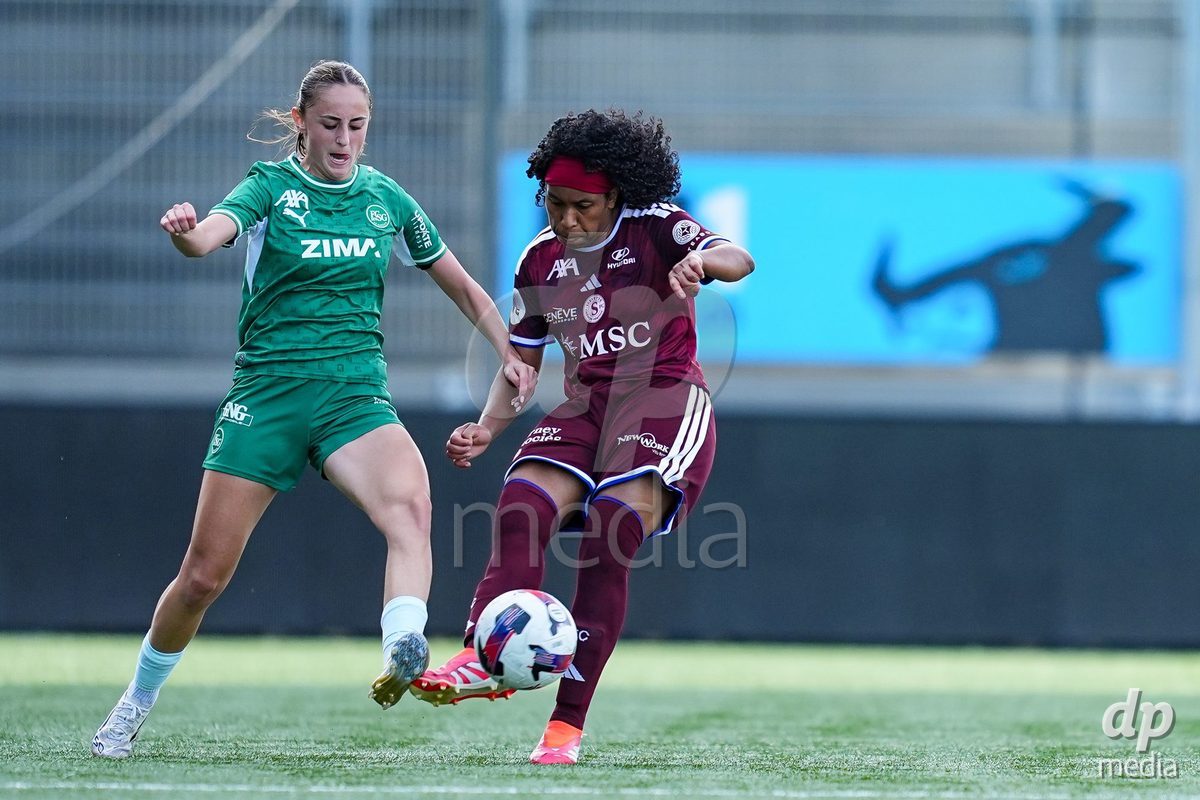 WIL, SWITZERLAND - OCTOBER 4: Mickaella Francoise Halooa Cardia of Servette FC Chenois Feminin (R) battles for the ball (duel) during the AXA Women's Super League match between FC St. Gallen 1879 and Servette FC Chenois Feminin at Lidl Sportpark on October 4, 2026 in Wil, Switzerland.