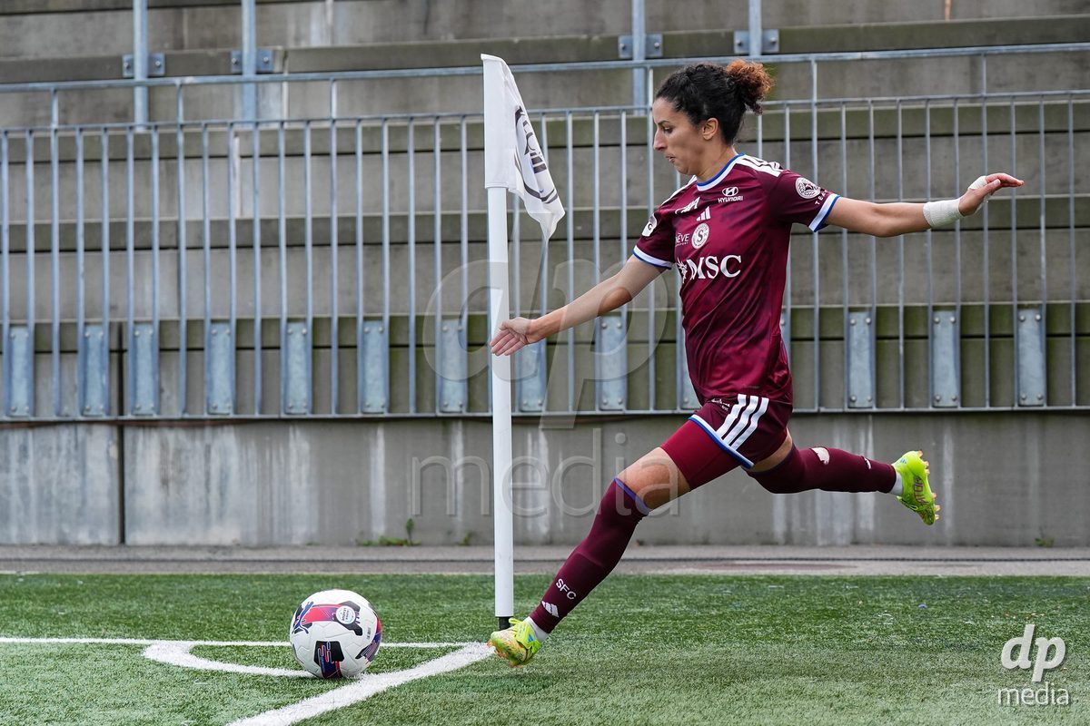 WIL, SWITZERLAND - OCTOBER 4: Ghoutia Karchouni of Servette FC Chenois Feminin shoots the ball during the AXA Women's Super League match between FC St. Gallen 1879 and Servette FC Chenois Feminin at Lidl Sportpark on October 4, 2026 in Wil, Switzerland.