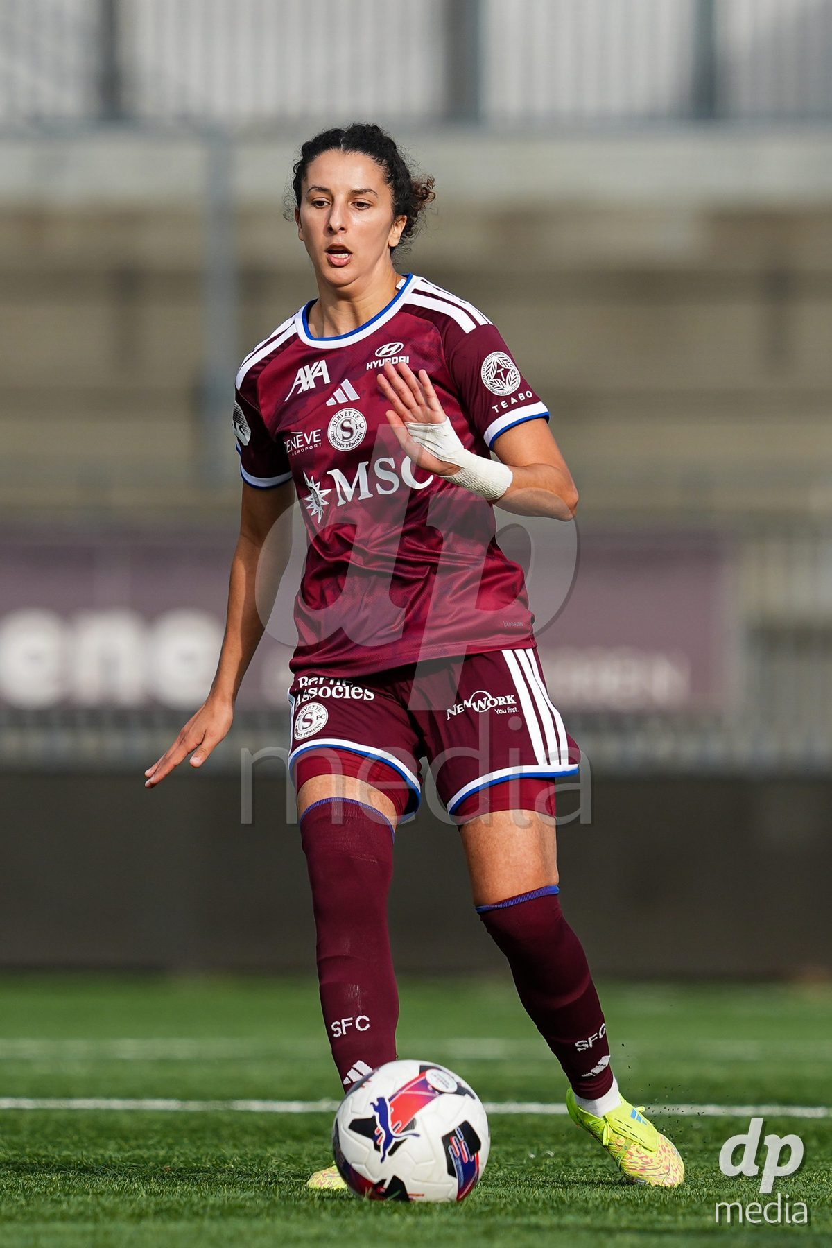 WIL, SWITZERLAND - OCTOBER 4: Ghoutia Karchouni of Servette FC Chenois Feminin controls the ball during the AXA Women's Super League match between FC St. Gallen 1879 and Servette FC Chenois Feminin at Lidl Sportpark on October 4, 2026 in Wil, Switzerland.