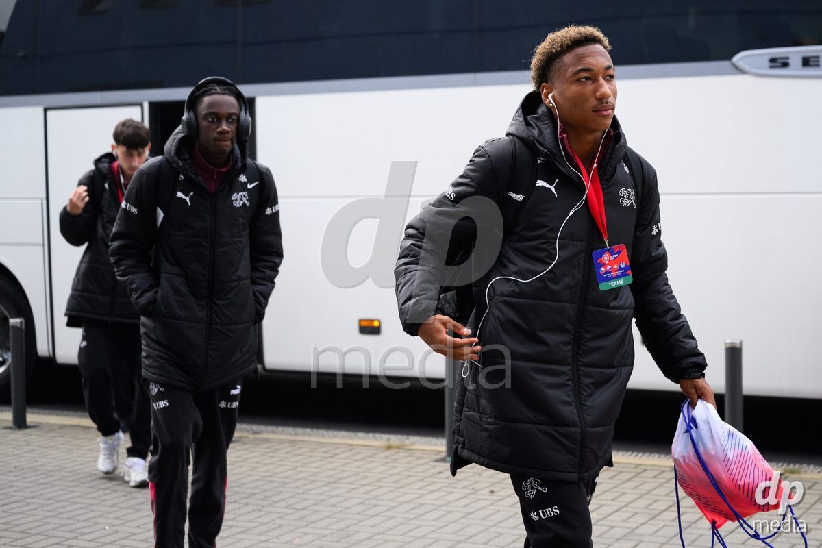 USTI NAD LABEM, CZECH REPUBLIC - OCTOBER 3: Bright Ocran (left) and Mathis Dind of Switzerland during the team's arrival at the stadium  before the International Friendly match between Slovakia and Switzerland on October 3, 2026 in Ustí nad Labem, Czech Republic.