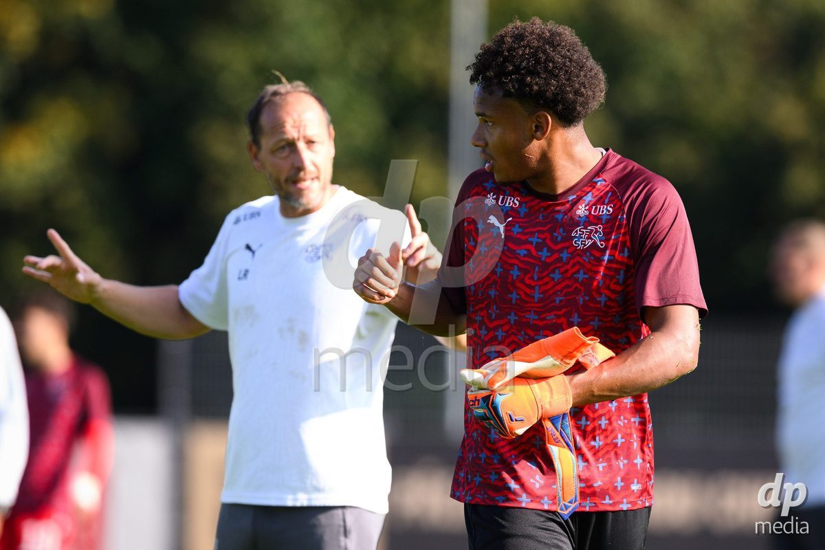 USTI NAD LABEM, CZECH REPUBLIC - OCTOBER 3:    Goalkeeper coach Luca Redaelli and Elijah Muogbo of Switzerland during warm up before the International Friendly match between Slovakia and Switzerland on October 3, 2026 in Ustí nad Labem, Czech Republic.