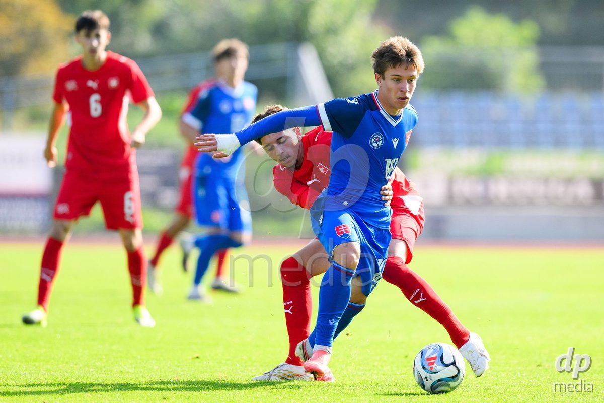 USTI NAD LABEM, CZECH REPUBLIC - OCTOBER 3: Matus Tomasko of Slovakia (forward) and Gabriel Roskovic of Switzerland during the International Friendly match between Slovakia and Switzerland on October 3, 2026 in Ustí nad Labem, Czech Republic.