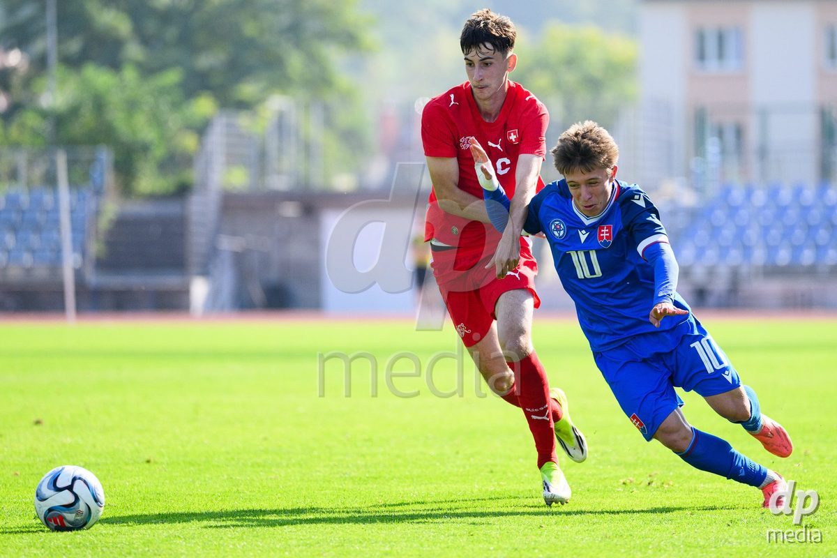 USTI NAD LABEM, CZECH REPUBLIC - OCTOBER 3:Aldin Smajic of Switzerland and Matus Tomasko of Slovakia during the International Friendly match between Slovakia and Switzerland on October 3, 2026 in Ustí nad Labem, Czech Republic.