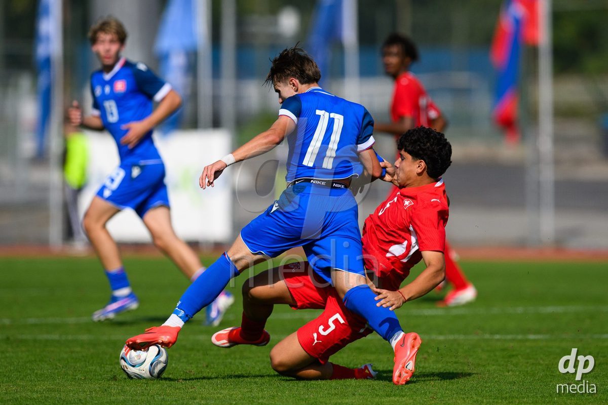 USTI NAD LABEM, CZECH REPUBLIC - OCTOBER 3: Richard Masny of Slovakia (no.11) and David Pavic of Switzerland during the International Friendly match between Slovakia and Switzerland on October 3, 2026 in Ustí nad Labem, Czech Republic.