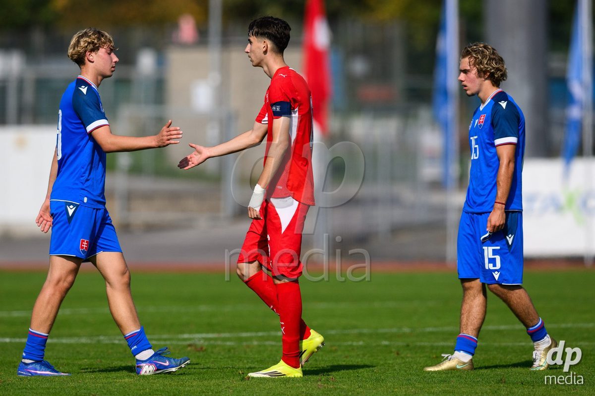 USTI NAD LABEM, CZECH REPUBLIC - OCTOBER 3: Peter Iuhanyak of Slovakia (left), Aldin Smajic of Switzerland and Michal Saxa of Slovakia after the International Friendly match between Slovakia and Switzerland on October 3, 2026 in Ustí nad Labem, Czech Republic.