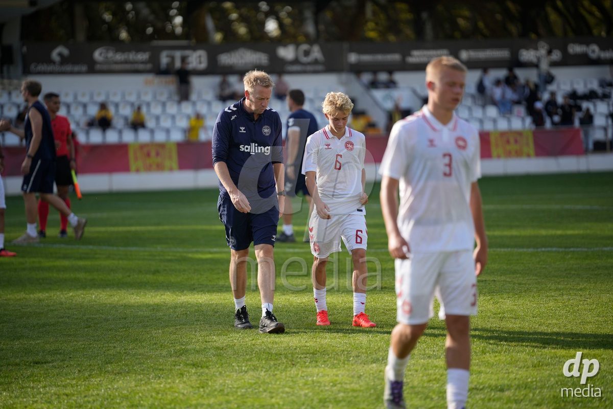 CALDAS DA RAINHA, PORTUGAL - OCTOBER 6: Morten Corlin, Head Coach of Denmark and Sofus Bruun of Denmark after the International Friendly match between Romania U16 and Denmark U16 at Campo da Mata on October 6, 2026 in Caldas da Rainha, Portugal.