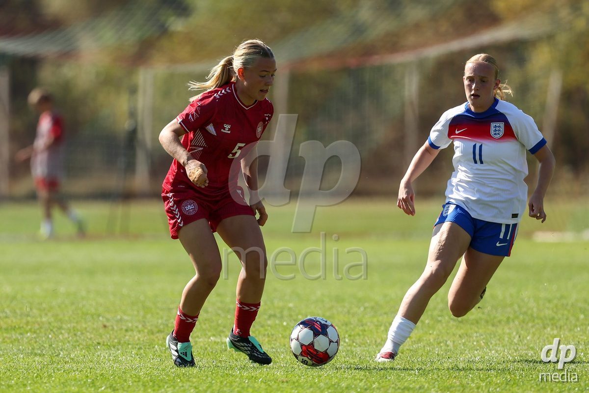 KAKANJ, BOSNIA AND HERZEGOVINA - OCTOBER 7: Astrid Engsig-Karup of Denmark and Phoebe De Bohan of England during the UEFA Womens European Under-19 Qualifier match between England and Denmark at Mladost Stadium on October 7, 2026 in Kakanj, Bosnia and Herzegovina.