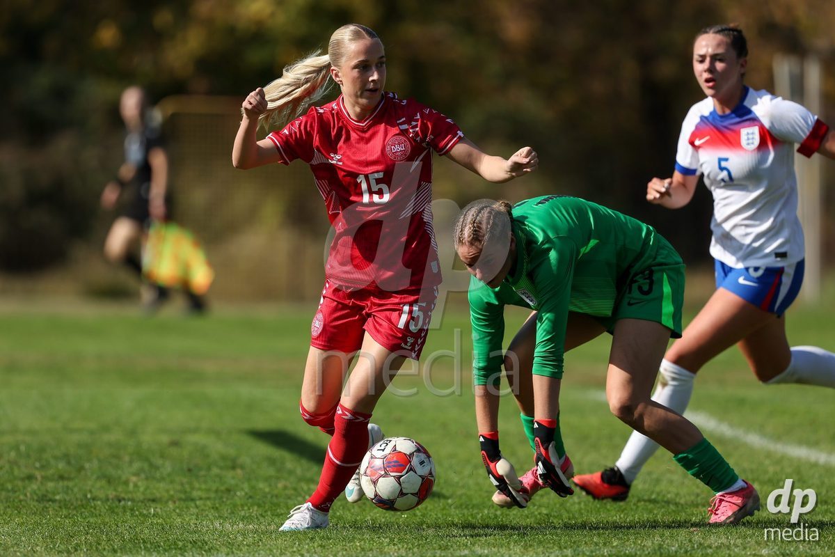 KAKANJ, BOSNIA AND HERZEGOVINA - OCTOBER 7: Evie Mitchell of England and Frederikke Ludvigsen of Denmark during the UEFA Womens European Under-19 Qualifier match between England and Denmark at Mladost Stadium on October 7, 2026 in Kakanj, Bosnia and Herzegovina.