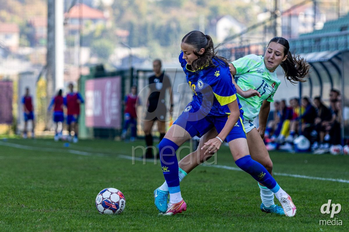 ZENICA, BOSNIA AND HERZEGOVINA - OCTOBER 7: Antonina Stuparevic of Bosnia and Herzegovina and Laura Kott of Switzerland during the UEFA Womens European Under-19 Qualifier match between Switzerland and Bosnia and Herzegovina at FF BH Football Training Centre on October 7, 2026 in Zenica, Bosnia and Herzegovina.