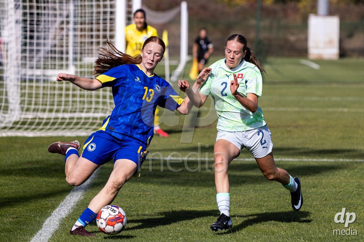 ZENICA, BOSNIA AND HERZEGOVINA - OCTOBER 7: Liel Rickenbach of Switzerland and Leona Ackar of Bosnia and Herzegovina during the UEFA Womens European Under-19 Qualifier match between Switzerland and Bosnia and Herzegovina at FF BH Football Training Centre on October 7, 2026 in Zenica, Bosnia and Herzegovina.