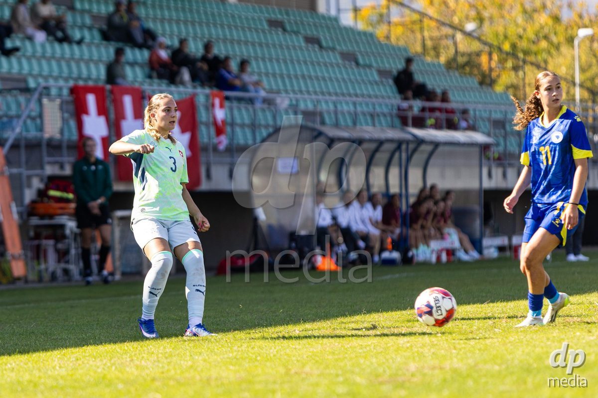 ZENICA, BOSNIA AND HERZEGOVINA - OCTOBER 7: Emilia Brunner of Switzerland and Sara Mujdzic of Bosnia and Herzegovina during the UEFA Womens European Under-19 Qualifier match between Switzerland and Bosnia and Herzegovina at FF BH Football Training Centre on October 7, 2026 in Zenica, Bosnia and Herzegovina.