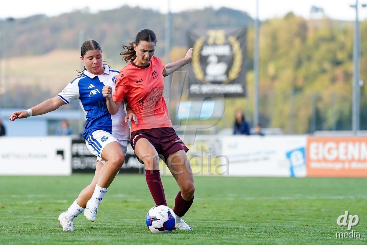 Switzerland: AXA Women's Cup 2026/27, FF Toggenburg v GC Frauenfussball - Breite Bütschwil: Michelle Storni of Grasshopper Club Zurich (L) battles for the ball (duel)