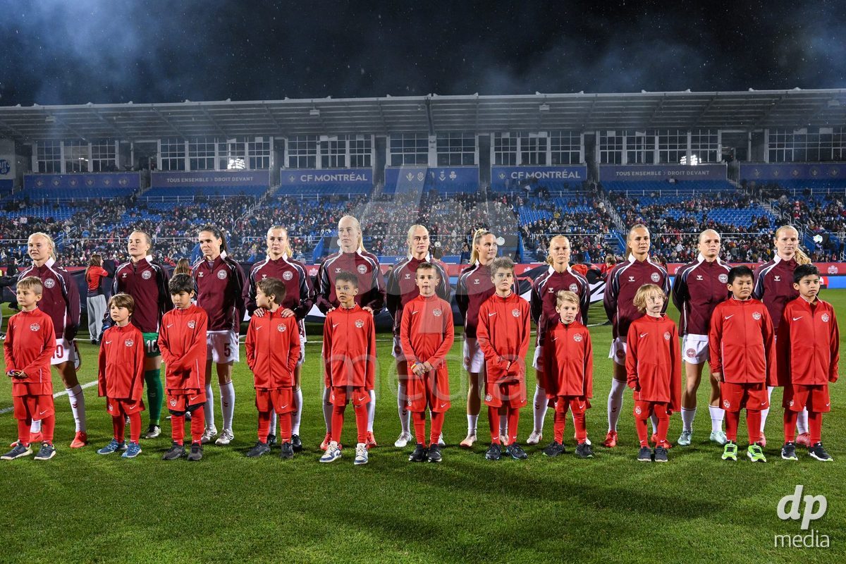 MONTREAL, CANADA - OCTOBER 9: Players of Denmark walk in for the national anthem prior to the International Women's Friendly football match between Canada and Denmark at Stade Saputo on October 9, 2026 in Montreal, Canada.