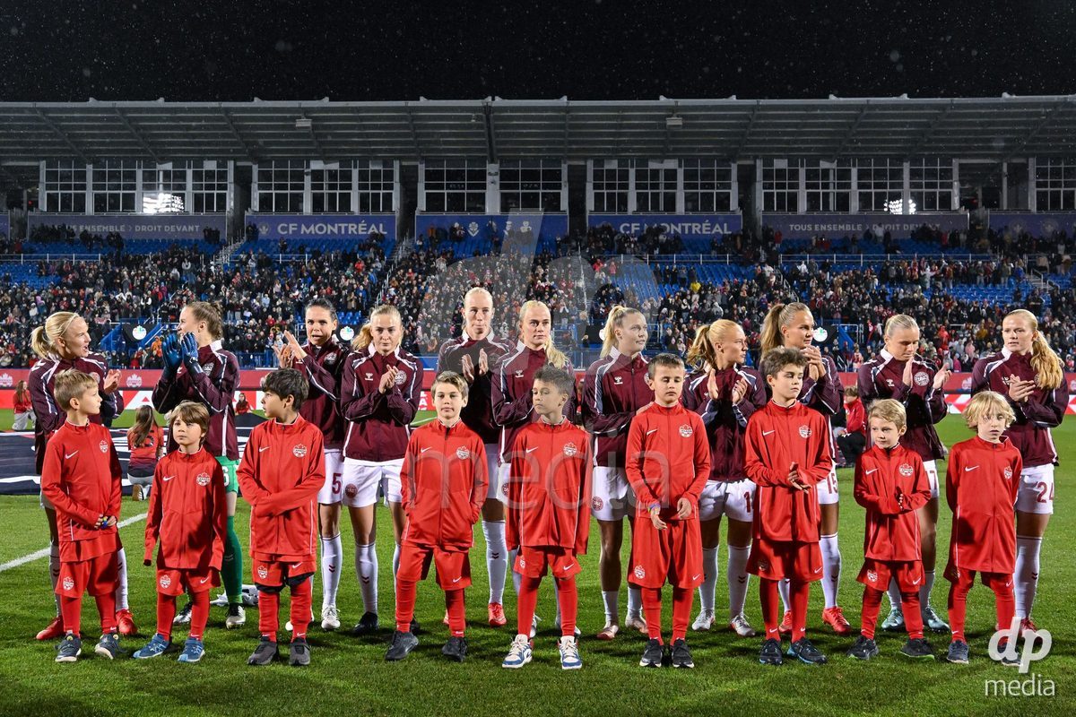 MONTREAL, CANADA - OCTOBER 9: Players of Denmark during the national anthem prior to to the International Women's Friendly football match between Canada and Denmark at Stade Saputo on October 9, 2026 in Montreal, Canada.