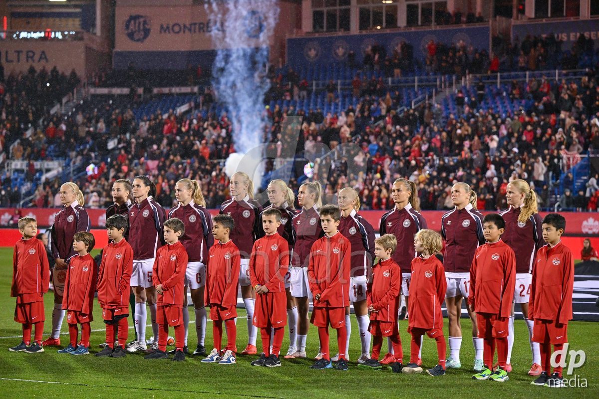 MONTREAL, CANADA - OCTOBER 9: Players of Denmark during the national anthem prior to to the International Women's Friendly football match between Canada and Denmark at Stade Saputo on October 9, 2026 in Montreal, Canada.