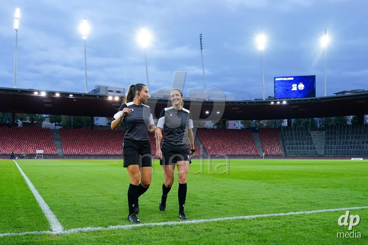 ZURICH, SWITZERLAND - OCTOBER 2: Referee Jessica Domingues (L) and Nadine Reichmuth during the AXA Women's Super League match between GC Frauenfussball and FC Zurich at Letzigrund on October 2, 2026 in Zurich, Switzerland.