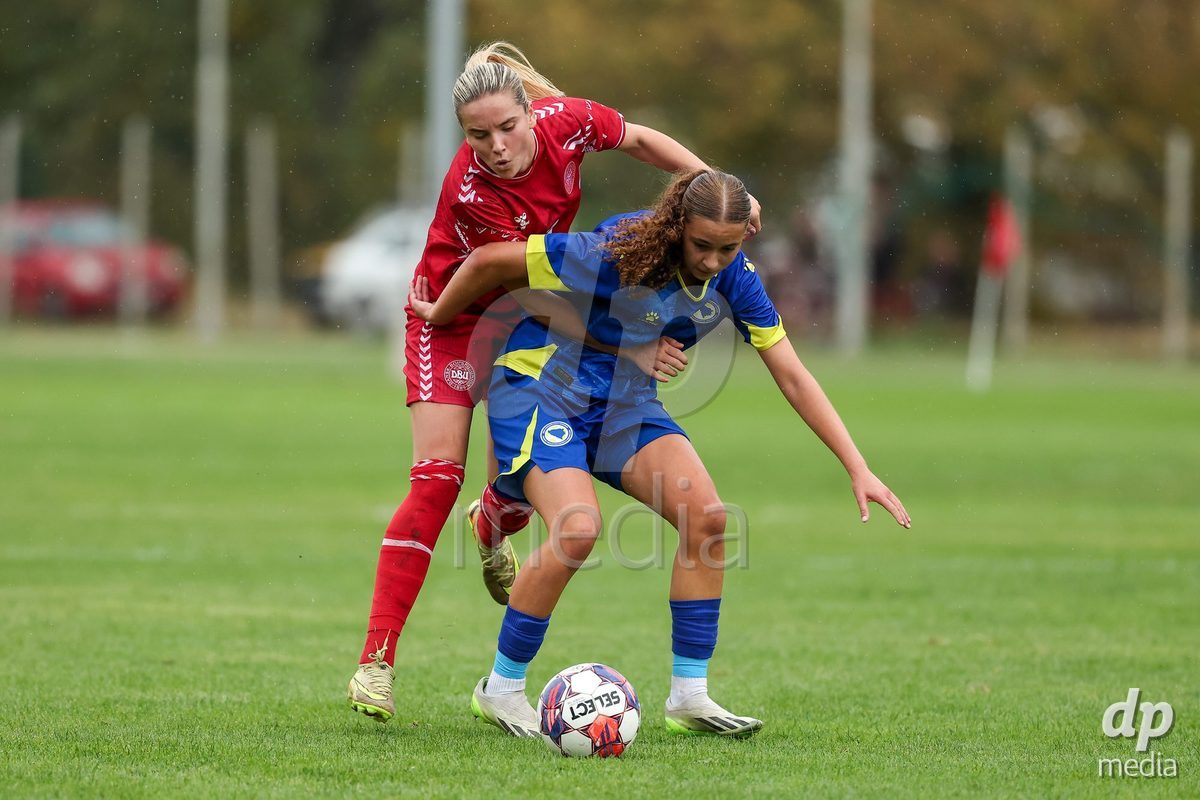 KAKANJ, BOSNIA AND HERZEGOVINA - OCTOBER 10: Nellie Mulvad Gejel of Denmark and Sara Mujdzic of Bosnia and Herzegovina during the UEFA Womens European Under-19 Qualifier match between Denmark and Bosnia and Herzegovina at Mladost Stadium on October 10, 2026 in Kakanj, Bosnia and Herzegovina. Photo: Armin Durgut/Pixsell/DP Media