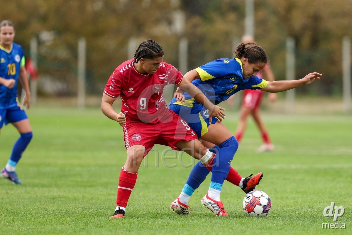 KAKANJ, BOSNIA AND HERZEGOVINA - OCTOBER 10: Thea Petersen of Denmark and Hana Mesan of Bosnia and Herzegovina during the UEFA Womens European Under-19 Qualifier match between Denmark and Bosnia and Herzegovina at Mladost Stadium on October 10, 2026 in Kakanj, Bosnia and Herzegovina. Photo: Armin Durgut/Pixsell/DP Media