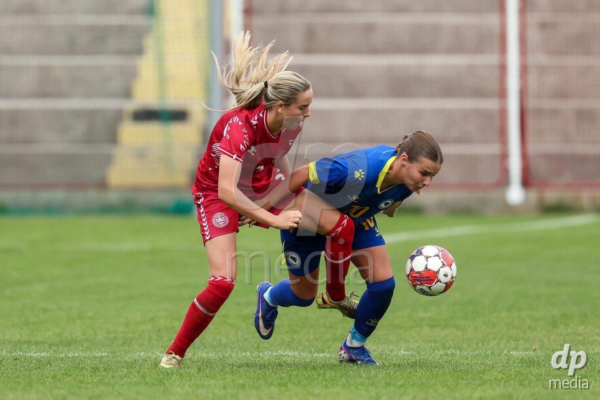 KAKANJ, BOSNIA AND HERZEGOVINA - OCTOBER 10: Nellie Mulvad Gejel of Denmark and Uma Hadzihajdarevic of Bosnia and Herzegovina during the UEFA Womens European Under-19 Qualifier match between Denmark and Bosnia and Herzegovina at Mladost Stadium on October 10, 2026 in Kakanj, Bosnia and Herzegovina. Photo: Armin Durgut/Pixsell/DP Media