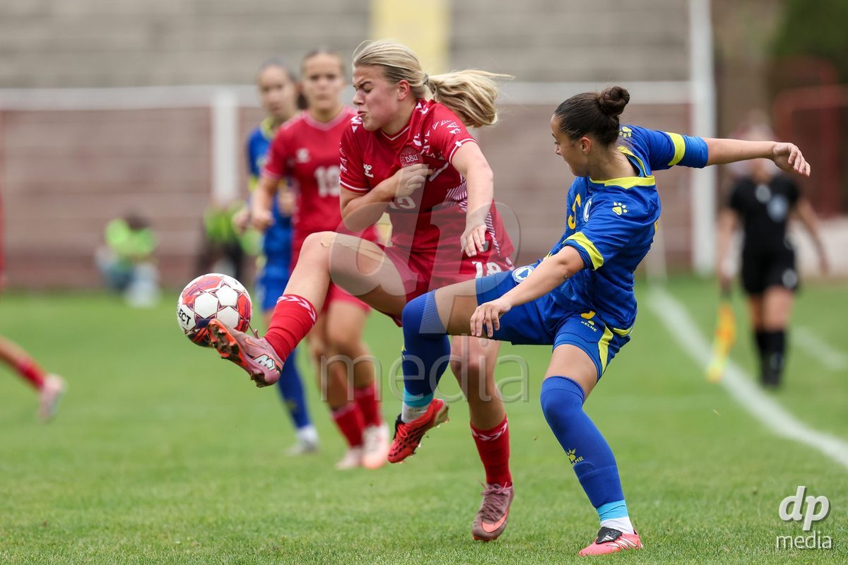 KAKANJ, BOSNIA AND HERZEGOVINA - OCTOBER 10: Frøya Stubgaard Ebbesvik of Denmark and Nejla Kajtazovic of Bosnia and Herzegovina during the UEFA Womens European Under-19 Qualifier match between Denmark and Bosnia and Herzegovina at Mladost Stadium on October 10, 2026 in Kakanj, Bosnia and Herzegovina. Photo: Armin Durgut/Pixsell/DP Media