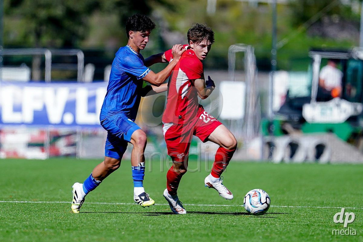 SCHAAN, LIECHTENSTEIN - OCTOBER 12: Loan Thommen of Switzerland and Noam Goldenberg of Israel battle for the ball during the UEFA European Under-17 Qualifier match between Israel and Switzerland at LFV Campus Rheinwiese on October 12, 2026 in Schaan, Liechtenstein.