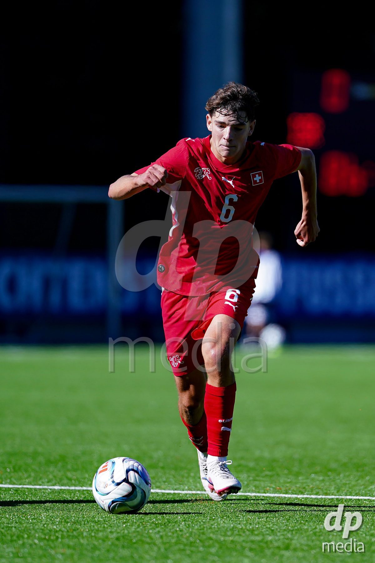 SCHAAN, LIECHTENSTEIN - OCTOBER 12: Niklas Zuger of Switzerland controls the ball during the UEFA European Under-17 Qualifier match between Israel and Switzerland at LFV Campus Rheinwiese on October 12, 2026 in Schaan, Liechtenstein.