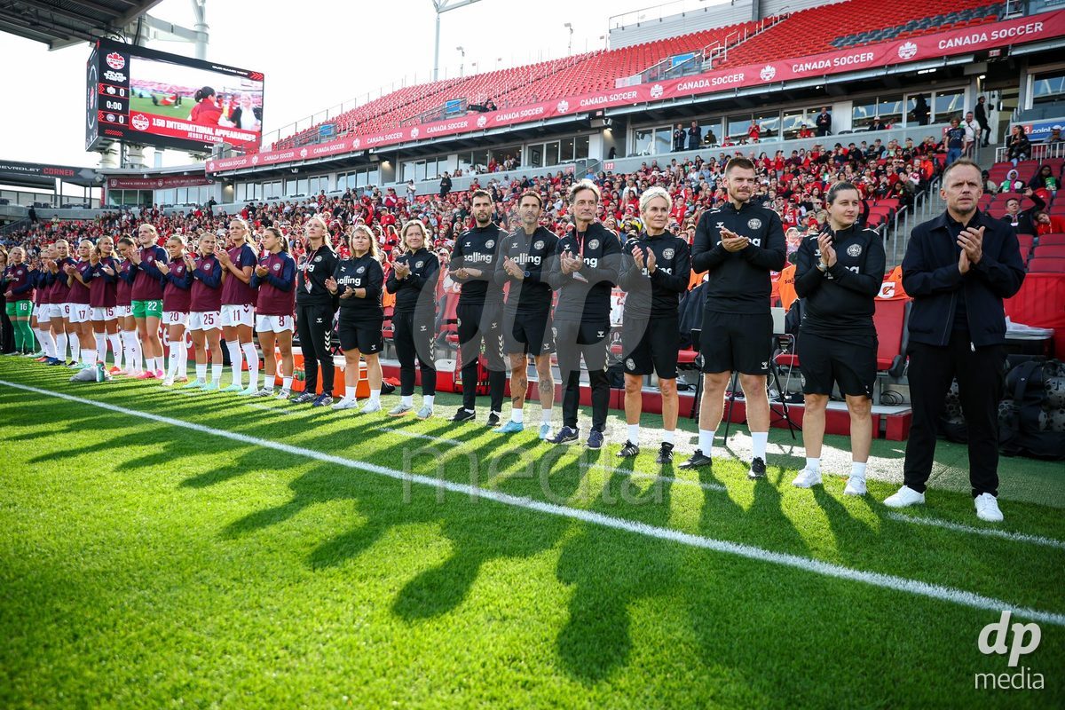 TORONTO, CANADA - OCTOBER 12: Players and staff members of Denmark during the national anthem prior to the International Friendly match between Canada and Denmark at BMO Field on October 12, 2026 in Toronto, Canada.