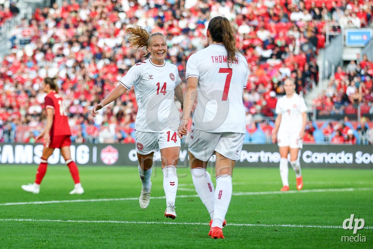 TORONTO, CANADA - OCTOBER 12: Janni Thomsen of Denmark celebrates the fourth team goal during the International Friendly match between Canada and Denmark at BMO Field on October 12, 2026 in Toronto, Canada.
