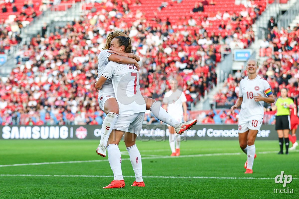 TORONTO, CANADA - OCTOBER 12: Janni Thomsen of Denmark celebrates the fourth team goal during the International Friendly match between Canada and Denmark at BMO Field on October 12, 2026 in Toronto, Canada.