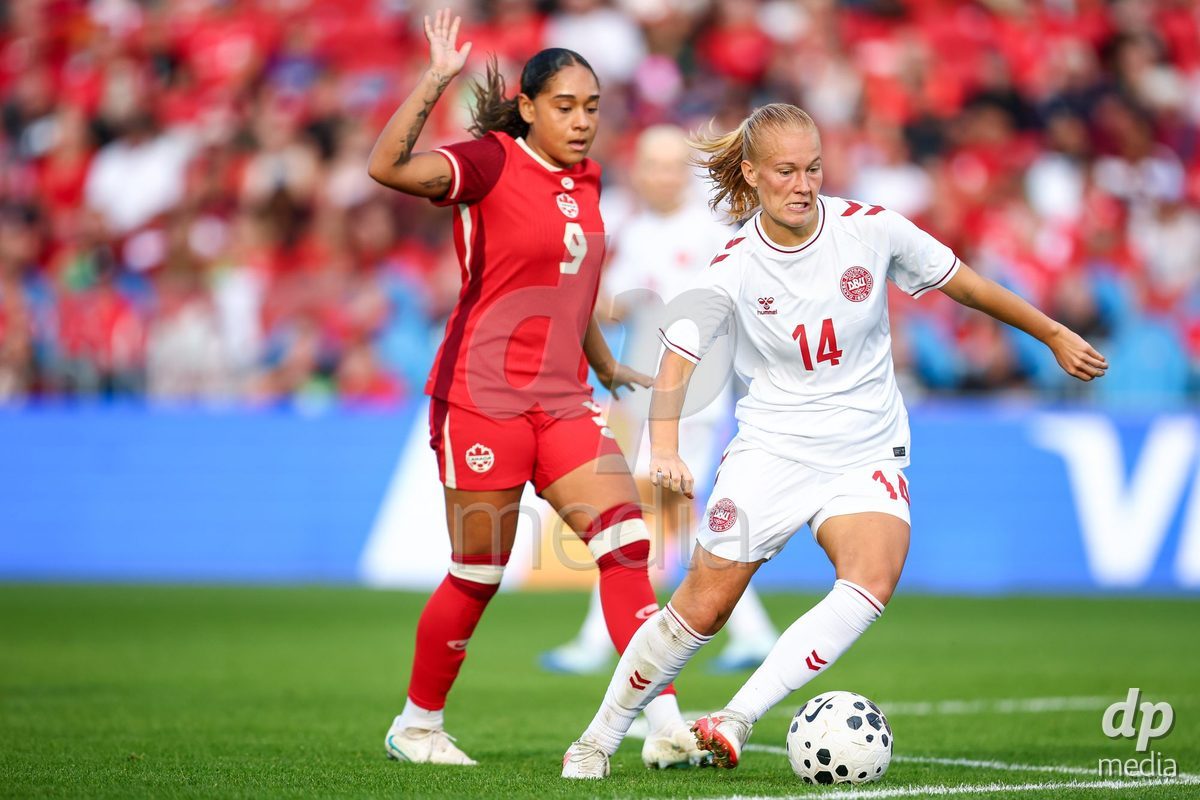 TORONTO, CANADA - OCTOBER 12: Sofie Bredgaard of Denmark (R) battles for the ball (duel) during the International Friendly match between Canada and Denmark at BMO Field on October 12, 2026 in Toronto, Canada.