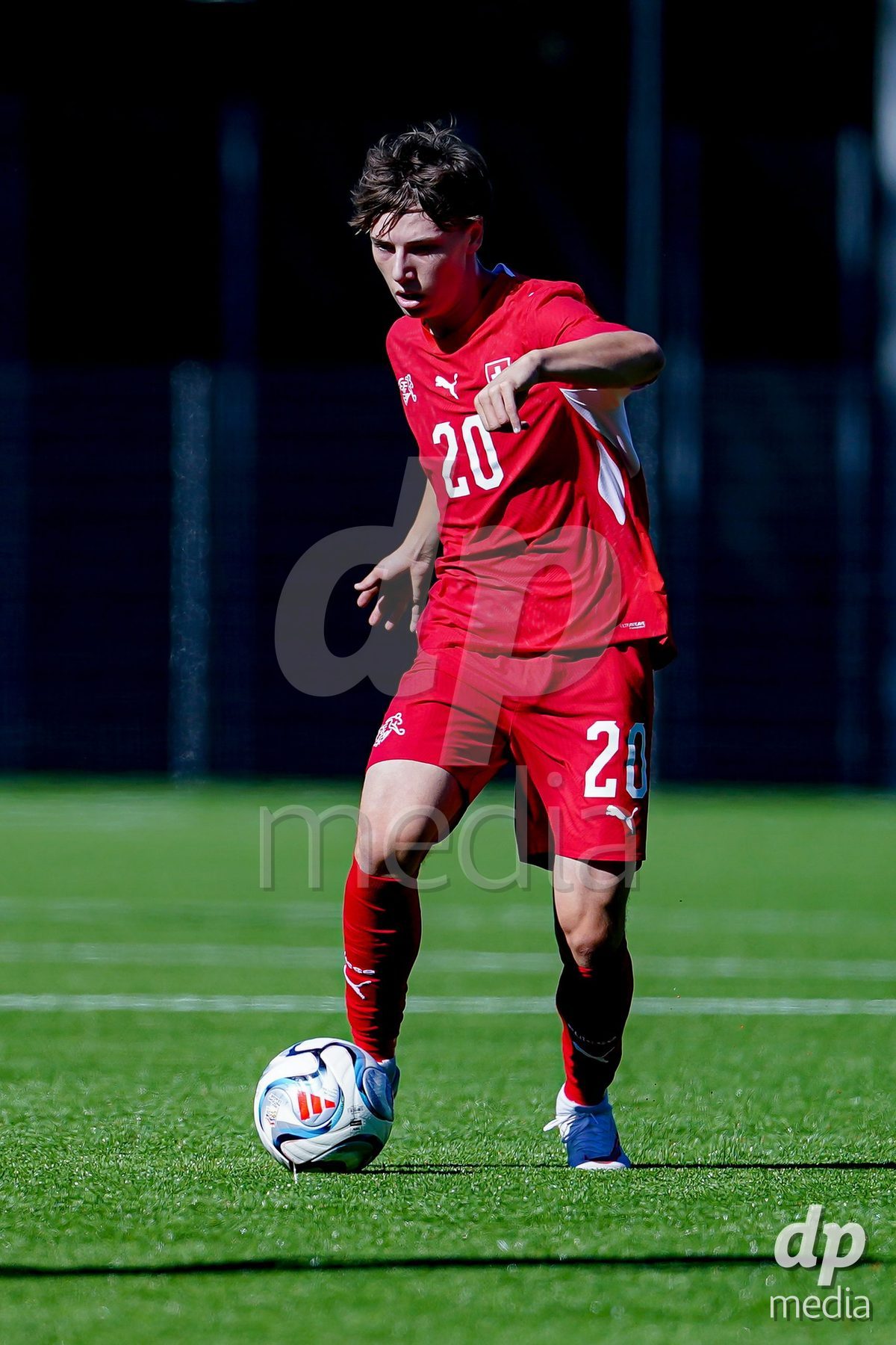 SCHAAN, LIECHTENSTEIN - OCTOBER 12: Loan Thommen of Switzerland controls the ball during the UEFA European Under-17 Qualifier match between Israel and Switzerland at LFV Campus Rheinwiese on October 12, 2026 in Schaan, Liechtenstein.