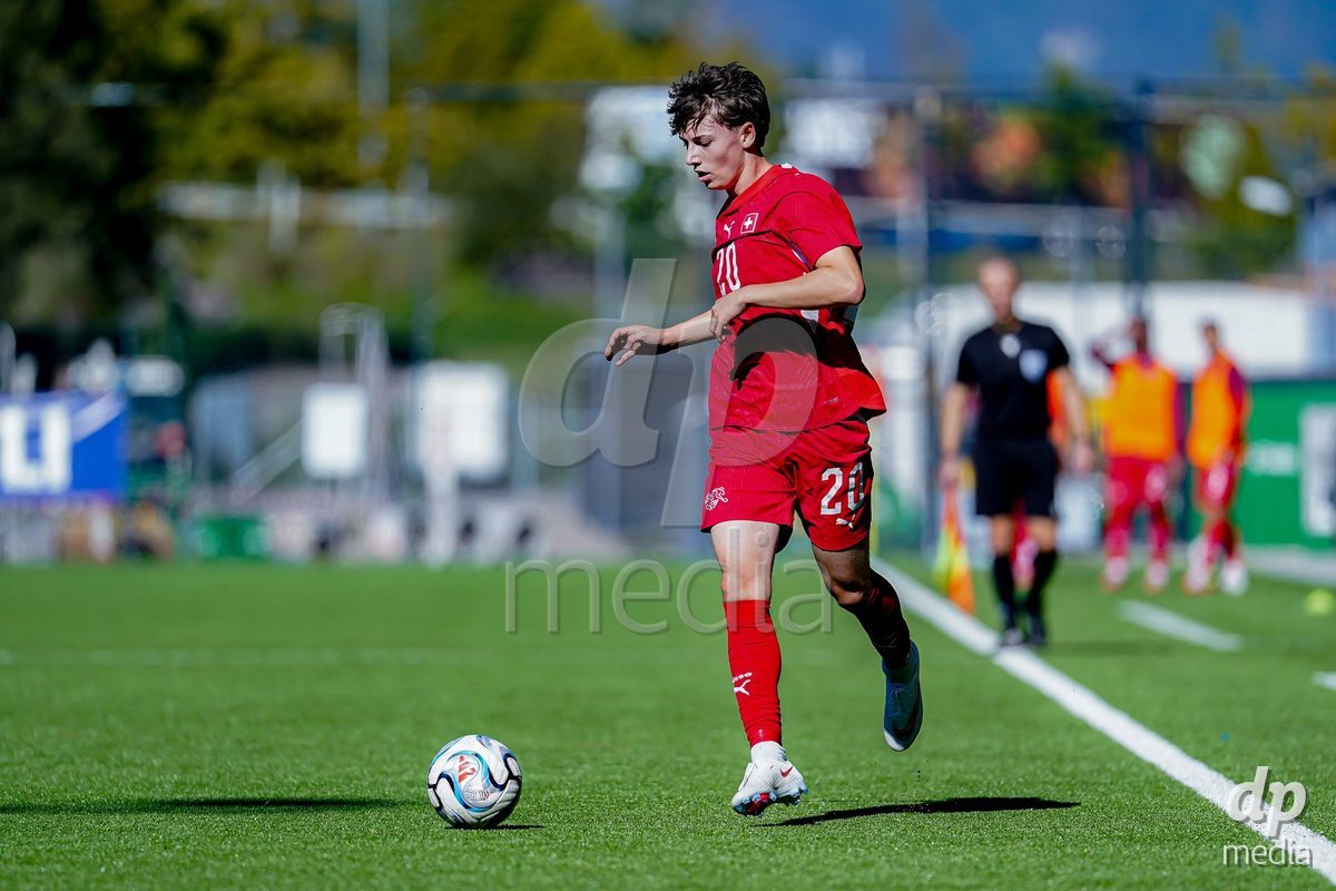 SCHAAN, LIECHTENSTEIN - OCTOBER 12: Loan Thommen of Switzerland controls the ball during the UEFA European Under-17 Qualifier match between Israel and Switzerland at LFV Campus Rheinwiese on October 12, 2026 in Schaan, Liechtenstein.