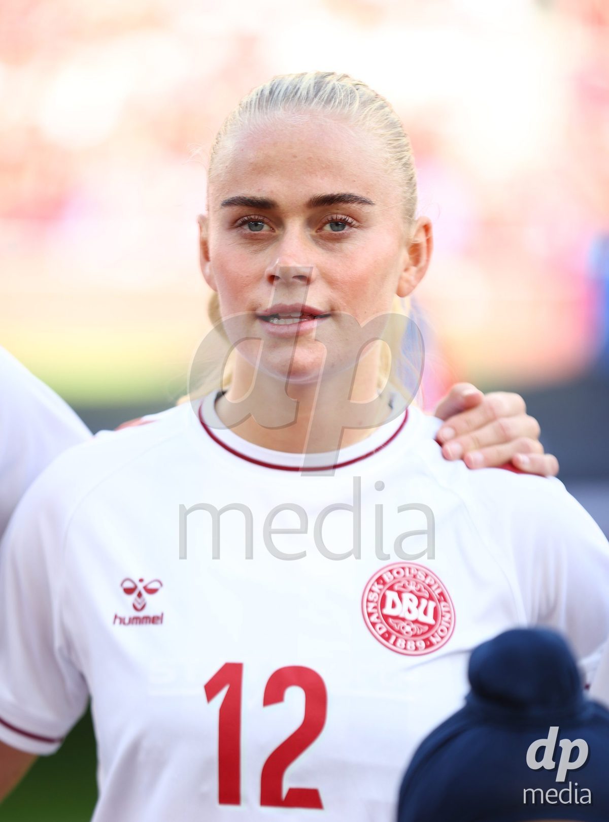 TORONTO, CANADA - OCTOBER 12: Katherine Møller Kühl of Denmark sings the national anthem before the International Friendly match against Canada at BMO Field on October 12, 2026 in Toronto, Canada.
