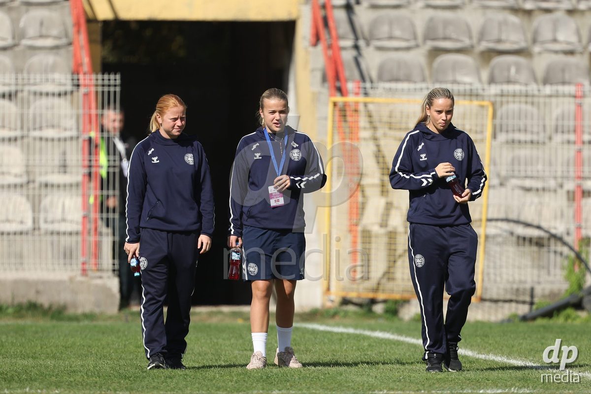 KAKANJ, BOSNIA AND HERZEGOVINA - OCTOBER 13: Alberte Mott of Denmark, Frøya Stubgaard Ebbesvik of Denmark and Nellie Mulvad Gejel of Denmark inspects the pitch prior to the UEFA Womens European Under-19 Qualifier match between Denmark and Switzerland at Mladost Stadium on October 13, 2026 in Kakanj, Bosnia and Herzegovina. Photo: Armin Durgut/Pixsell/DP Media
