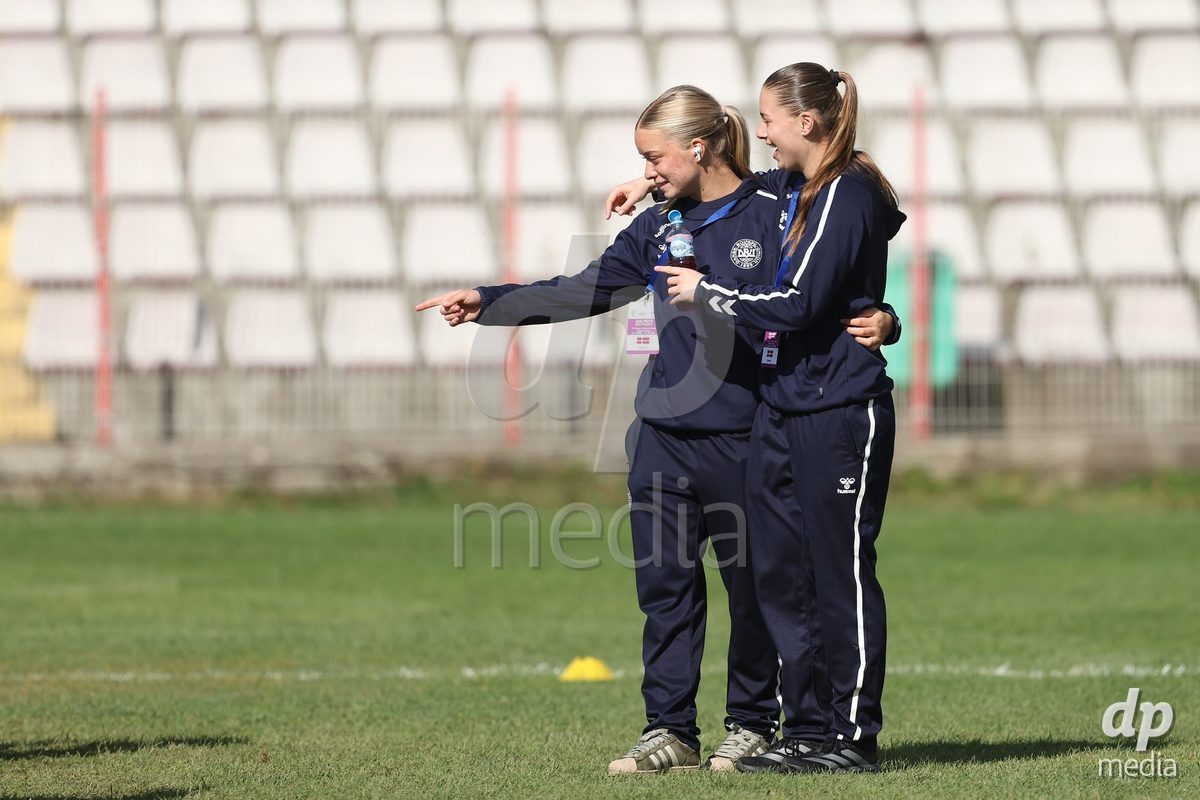 KAKANJ, BOSNIA AND HERZEGOVINA - OCTOBER 13: Evelina Thygesen of Denmark and Isabella Andersen of Denmark inspects the pitch prior to the UEFA Womens European Under-19 Qualifier match between Denmark and Switzerland at Mladost Stadium on October 13, 2026 in Kakanj, Bosnia and Herzegovina. Photo: Armin Durgut/Pixsell/DP Media