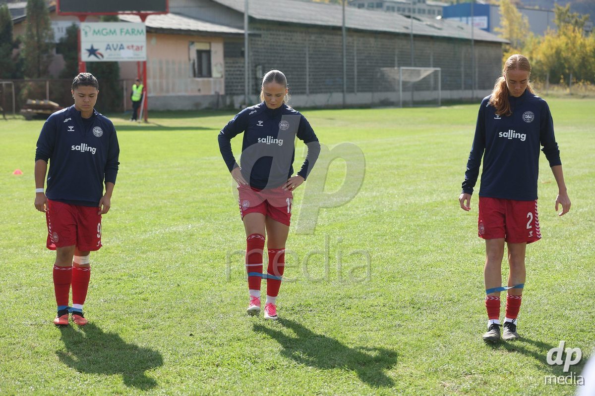 KAKANJ, BOSNIA AND HERZEGOVINA - OCTOBER 13: Thea Petersen of Denmark, Caroline Ahle of Denmark and Andrea Jeppesen of Denmark warms up prior to the UEFA Womens European Under-19 Qualifier match between Denmark and Switzerland at Mladost Stadium on October 13, 2026 in Kakanj, Bosnia and Herzegovina. Photo: Armin Durgut/Pixsell/DP Media