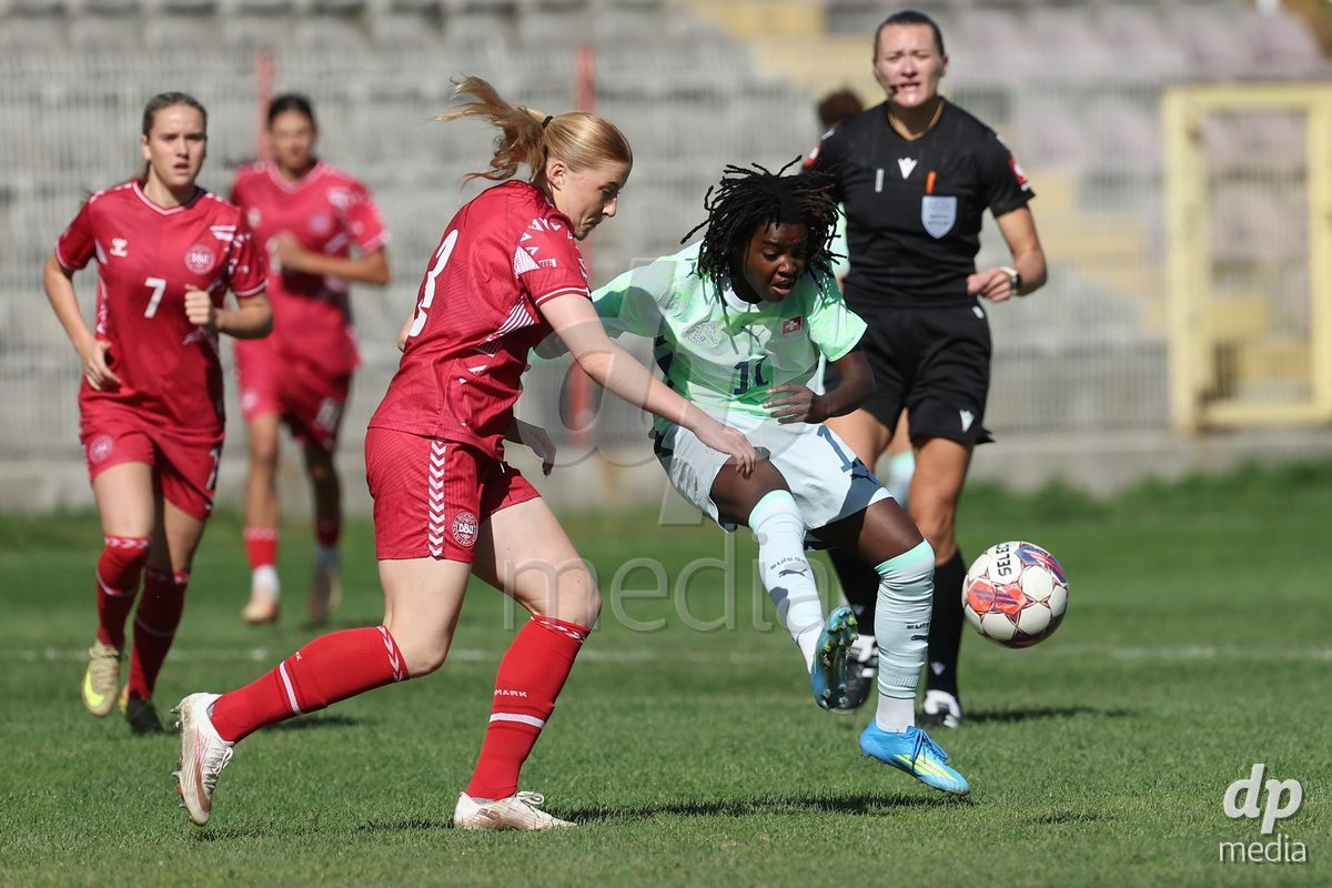 KAKANJ, BOSNIA AND HERZEGOVINA - OCTOBER 13: Asta Kynde of Denmark and Garance Nein of Switzerland competes for the ball during the UEFA Womens European Under-19 Qualifier match between Denmark and Switzerland at Mladost Stadium on October 13, 2026 in Kakanj, Bosnia and Herzegovina. Photo: Armin Durgut/Pixsell/DP Media
