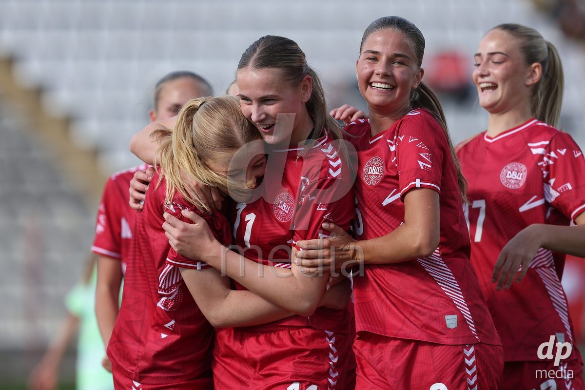 KAKANJ, BOSNIA AND HERZEGOVINA - OCTOBER 13: Asta Kynde of Denmark, Andrea Thierry of Denmark, Josephine Behrmann Lamp of Denmark and Mille Kjaergaard of Denmark celebrate after Asta Kynde of Denmark score a goal for 6:2 during the UEFA Womens European Under-19 Qualifier match between Denmark and Switzerland at Mladost Stadium on October 13, 2026 in Kakanj, Bosnia and Herzegovina. Photo: Armin Durgut/Pixsell/DP Media