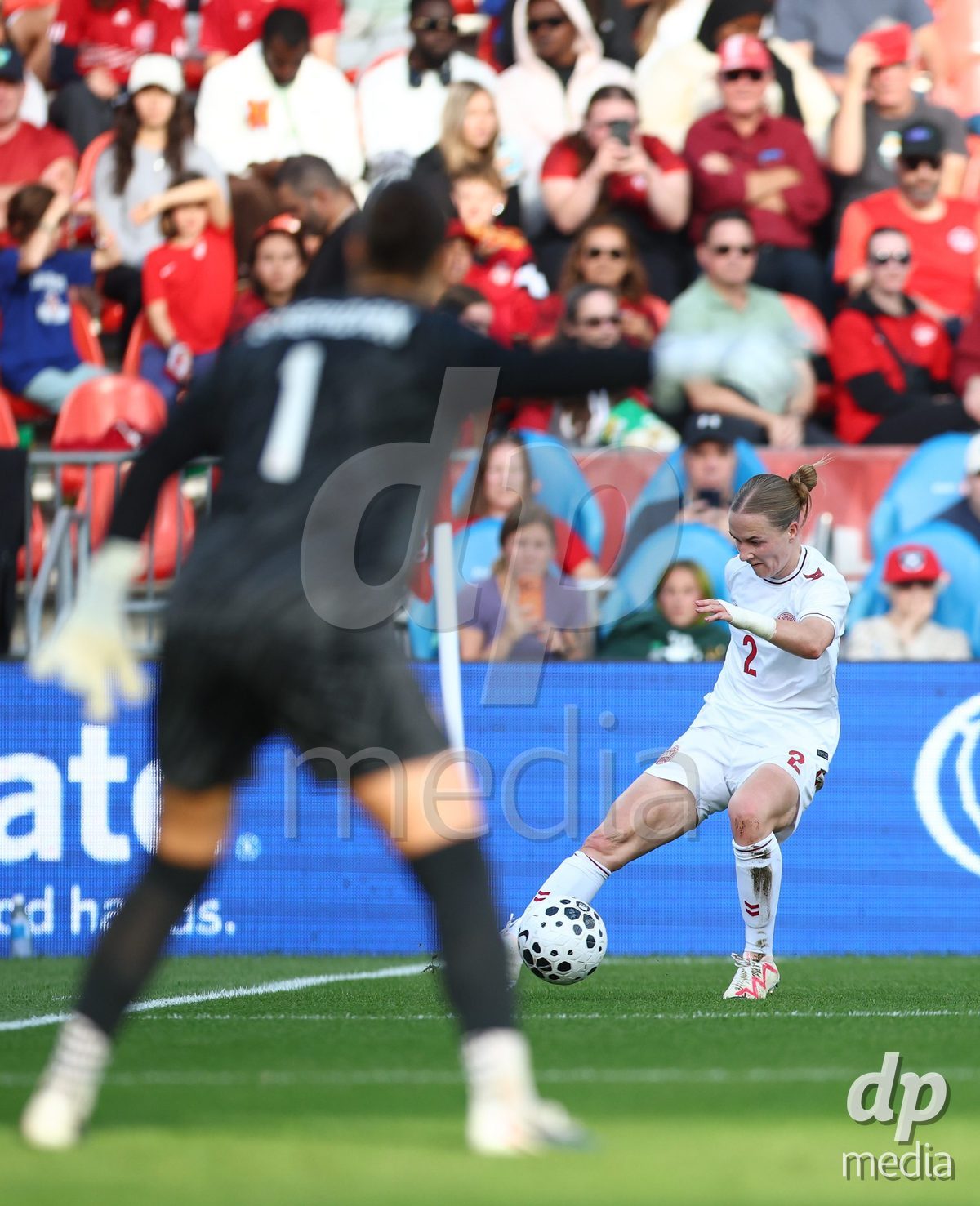 TORONTO, CANADA - OCTOBER 12: Sara Thrige of Denmark crosses the ball during the International Friendly match against Canada at BMO Field on October 12, 2026 in Toronto, Canada.