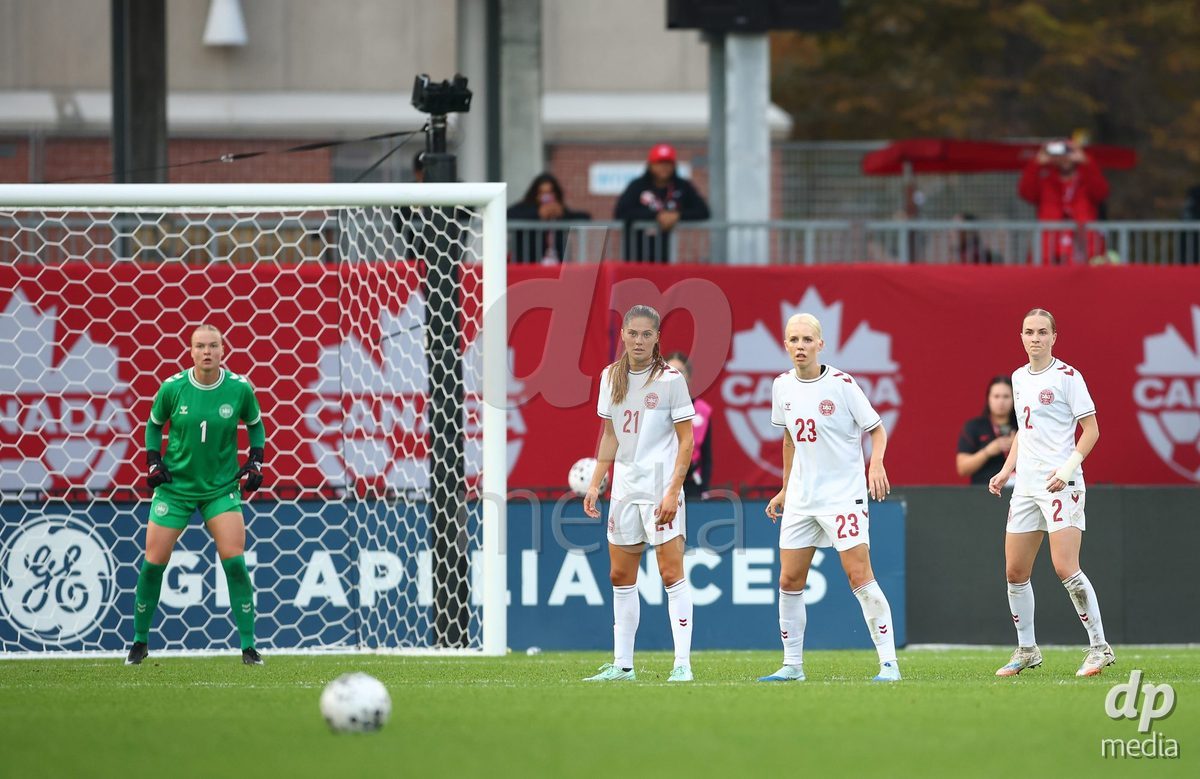 TORONTO, CANADA - OCTOBER 12: Freja Thisgaard, Mille Gejl, Sofie Svava and Sara Thrige of Denmark prepare for a free kick during the International Friendly match against Canada at BMO Field on October 12, 2026 in Toronto, Canada.