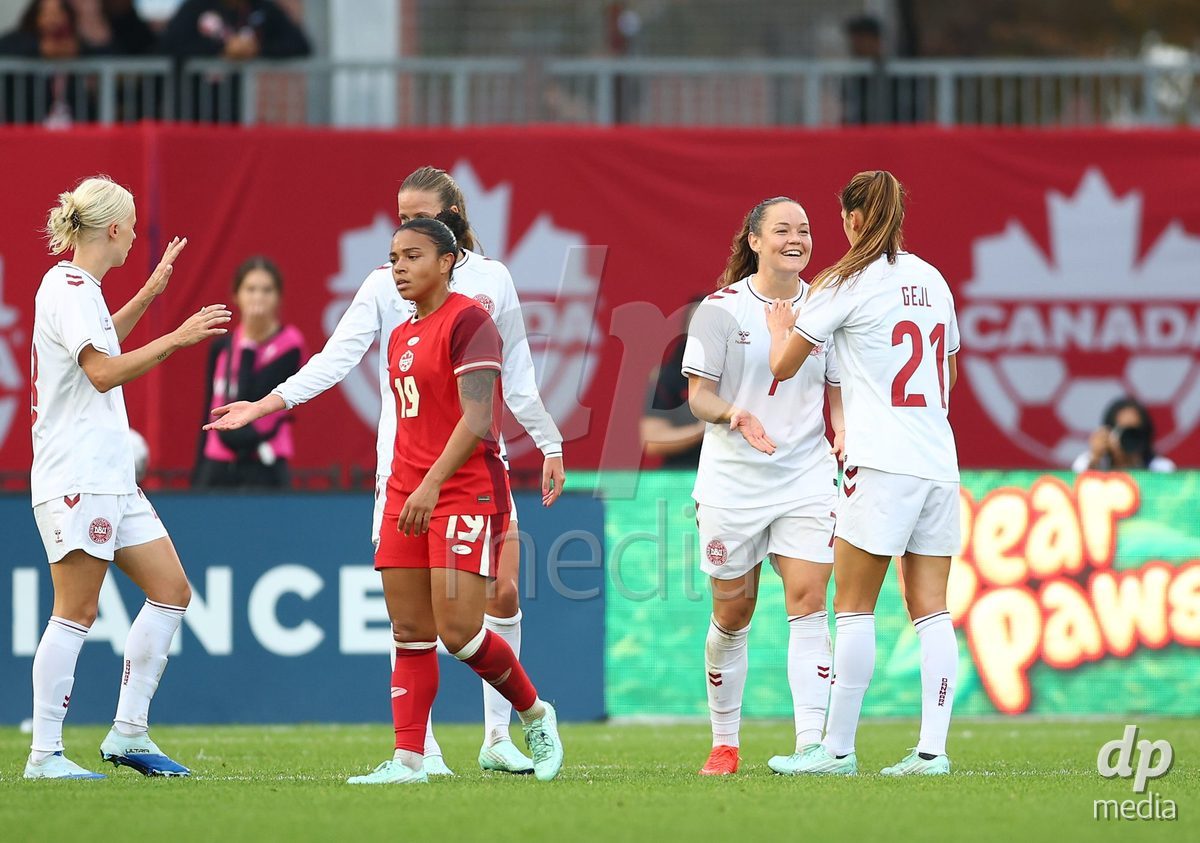TORONTO, CANADA - OCTOBER 12: Mille Gejl and Janni Thomsen of Denmark celebrate the win during the International Friendly match against Canada at BMO Field on October 12, 2026 in Toronto, Canada.