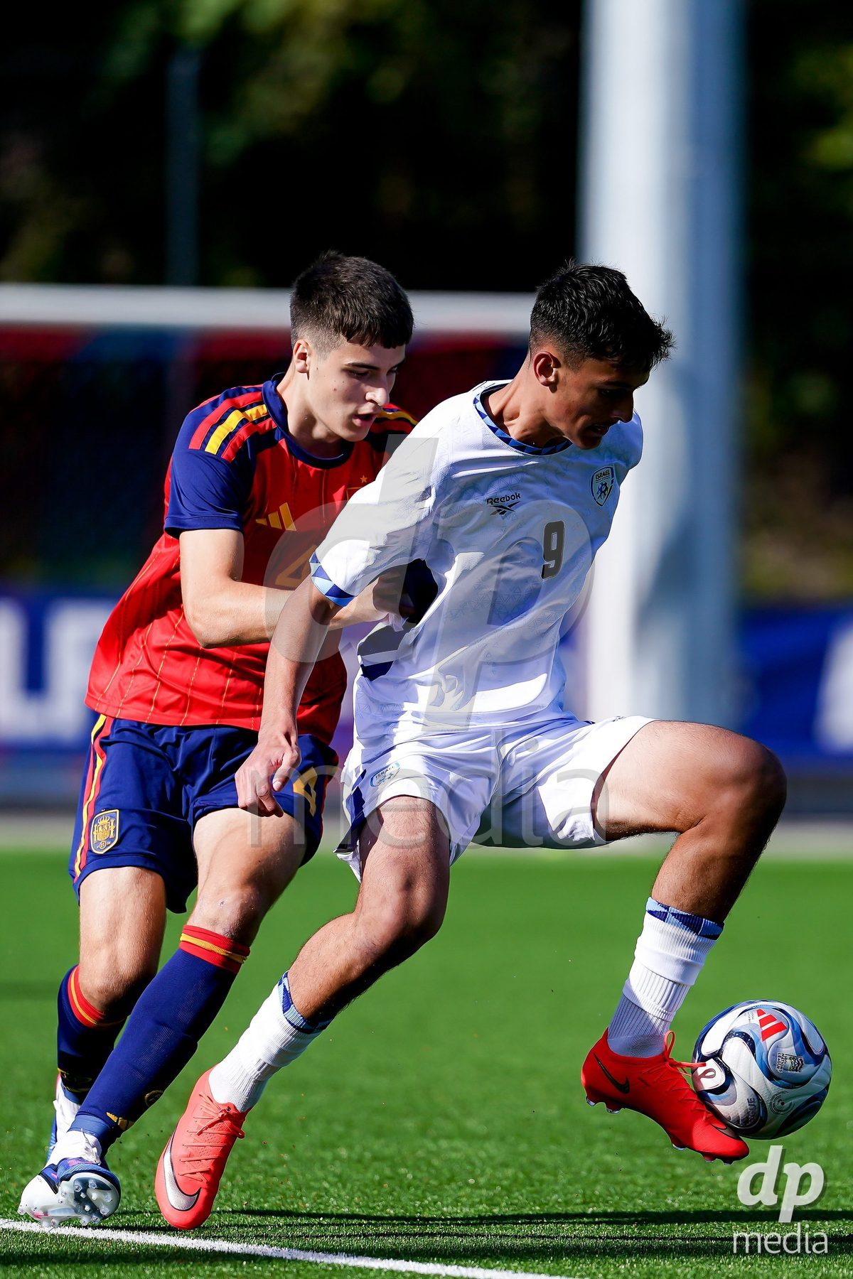 SCHAAN, LIECHTENSTEIN - OCTOBER 15: Ariel Dorra of Israel and Kemen Mitxelena of Spain battle for the ball during the UEFA European Under-17 Qualifier match between Spain and Israel at LFV Campus Rheinwiese on October 15, 2026 in Schaan, Liechtenstein.