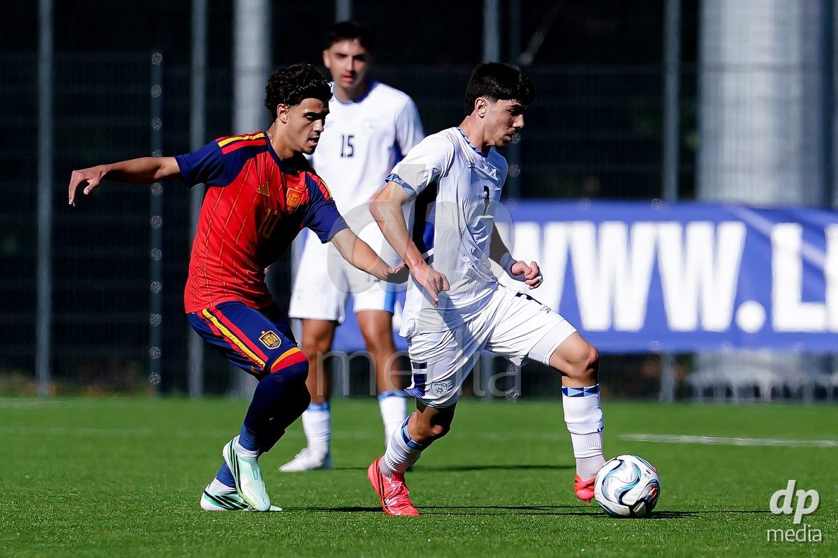 SCHAAN, LIECHTENSTEIN - OCTOBER 15: Yotam Kalfa of Israel and Aitor Torondel of Spain battle for the ball during the UEFA European Under-17 Qualifier match between Spain and Israel at LFV Campus Rheinwiese on October 15, 2026 in Schaan, Liechtenstein.